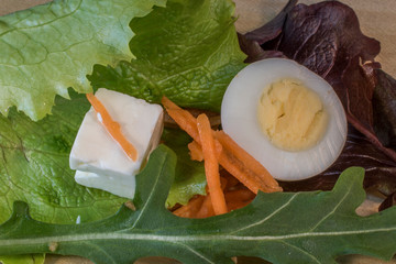 Hard-boiled egg, tomato, cheese, carrot, salad