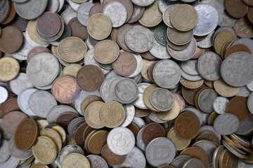 Money, coins, collection of old, invalid international coins. Close up, background, texture