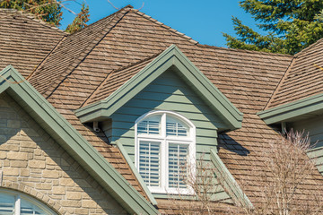 The top of the house or apartment building with nice window
