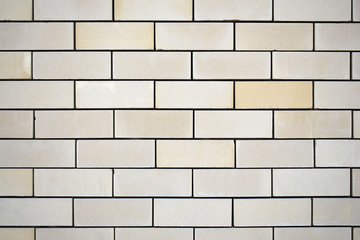 Close up view of white brick wall background with copy space - medium