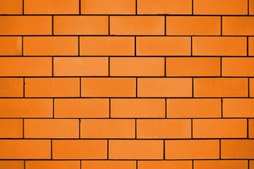 Close up view of brown brick wall background with copy space - medium