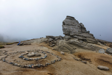 The Sphinx of Bucegi Natural Park, Carpathian Mountains, Romania - in a cloudy summer day.