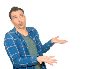 Portrait of annoyed man gesturing, expressing confusion, frownin