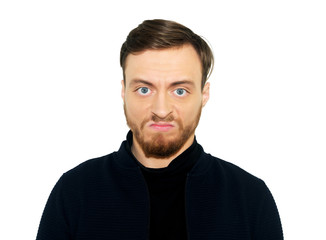 portrait of angry young man, isolated on white wall background.