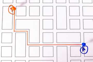 Street map with thumbtacks marking a route