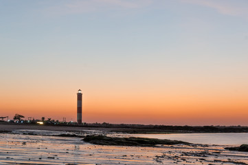 Dusk shot at Shivrajpur beach gujarat India with lighthouse and waves