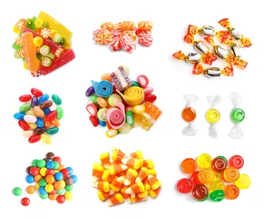 Gordijnen Set of different tasty candies on white background, top view © New Africa