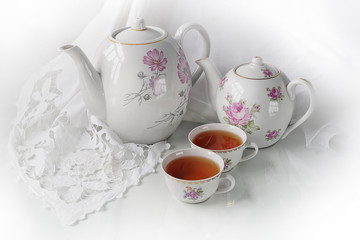 Cup of tea, tea, candy, isolated with white napkin