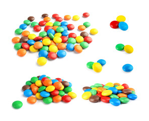 Set of tasty colorful candies on white background