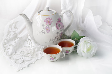 Cup of tea, tea, candy, isolated with white napkin