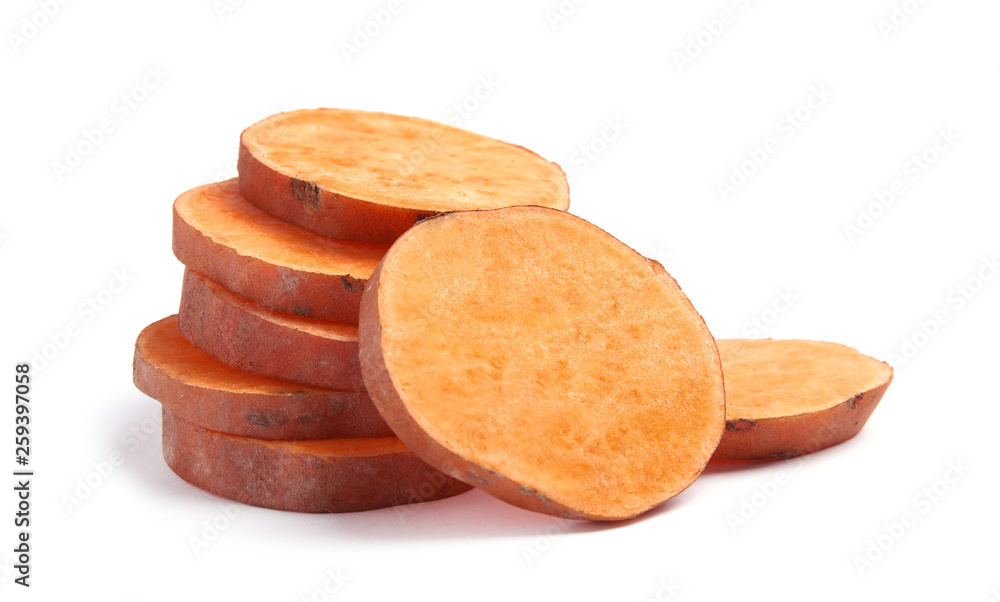 Wall mural Slices of ripe sweet potato on white background