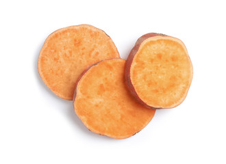 Slices of ripe sweet potato on white background, top view