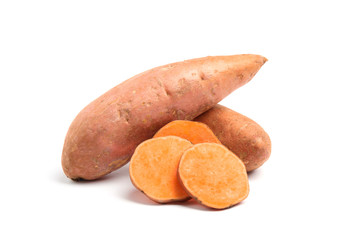 Fresh ripe sweet potatoes on white background