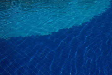 blue water in swimming pool