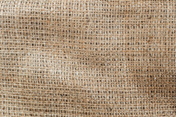 Highly detailed texture of burlap. Sackcloth background with free space for text input, logo, etc.