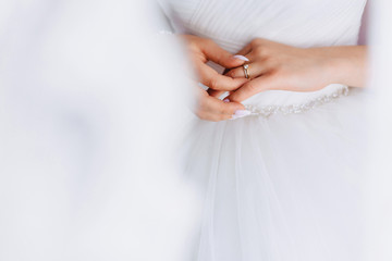 engagement ring with a stone on the gentle bride's hand