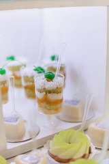 sweet festive buffet, fruit, caps, macaroni and lots of sweets