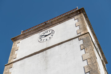 Fototapeta na wymiar Old clock tower on Vila Nova de Foz Coa
