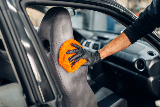 Chemical cleaning of car seats with spoonge