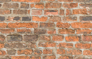 Seamless background of wall of orange brick. Design concept. Seamless pattern