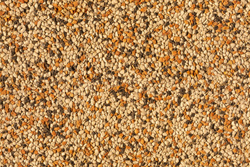 Seamless background of wall of multicolored stones. Design concept. Seamless pattern
