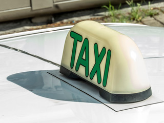 Taxi sign on roof of vehicle in Sao Paulo city