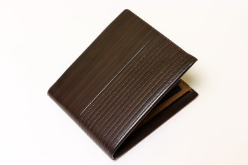 Brown wallet on white background isolated.