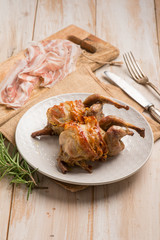 baked quail bacon wrapped and rosemary
