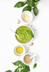 Pesto sauce with ingredients, overhead view