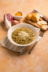 chicory risotto with curcuma and scamorza cheese