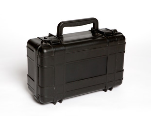 middle size black plastic case on the white background