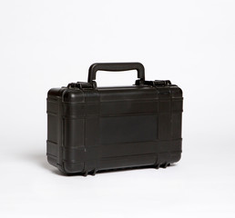 middle size black plastic case on the white background