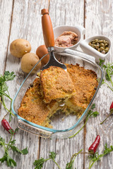 potato cake with tuna capers and hot chili pepper