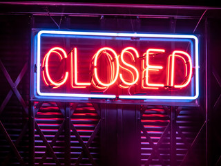 Closed neon sign on the door in Brazil