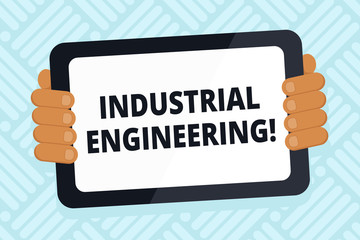 Handwriting text writing Industrial Engineering. Conceptual photo field or study that focuses on industrial processes Color Tablet Smartphone with Blank Screen Handheld from the Back of Gadget