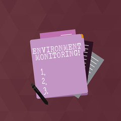 Writing note showing Environment Monitoring. Business concept for observing and studying conditions of the environment Lined Paper Stationery Partly into View from Pastel Folder