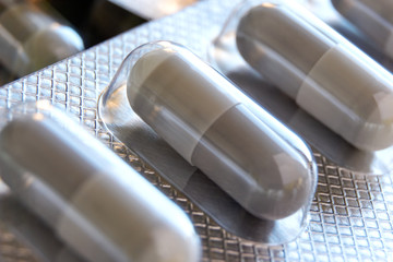 Macro close up of medical capsule pills in blister pack strip