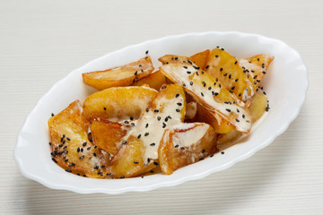 golden country potatoes, baked in cream sauce, vegetarian