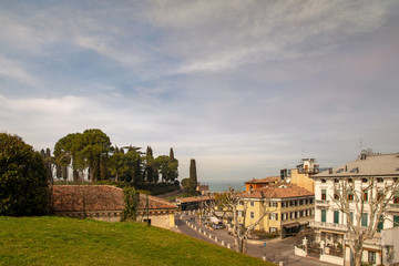 High angle view of Peschiera del Garda, an ancient town on the shore of Lake Garda in the province of Verona, in a sunny spring day, Veneto, Italy