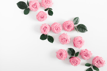 Beautiful flowers composition. Pink rose flowers on white background. Valentines Day, Easter, Birthday, Happy Women's Day, Mother's day. Flat lay, top view, copy space