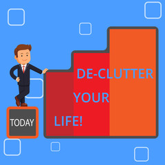 Handwriting text writing De Clutter Your Life. Conceptual photo remove mess clutter from place organize and prioritize Happy Businessman Presenting Growth and Success in Rising Bar Graph Columns