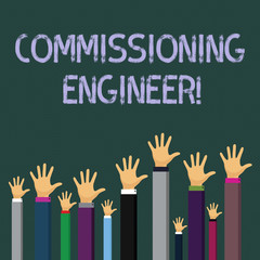 Writing note showing Commissioning Engineer. Business concept for ensure all aspects of building are properly designed Businessmen Hands Raising Up Above the Head, Palm In Front
