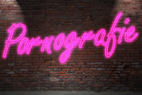Leuchtreklame Pornografie an Ziegelsteinmauer