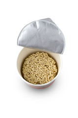 Egg noodles on a white background. Dry egg noodles in a container on a white background.