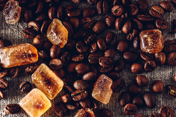Roasted coffee beans and crystalline sugar