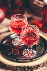 Homemade red currant nalivka and chocolate