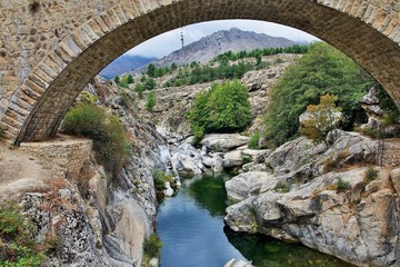 Fototapeta na wymiar Corsica-bridge over the river Golo
