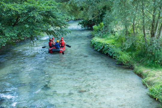 People rafting in river