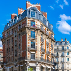 Fototapeta na wymiar Paris, beautiful building in the center, typical parisian facades and windows