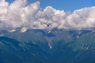 Fototapeta premium Mountain range in clouds